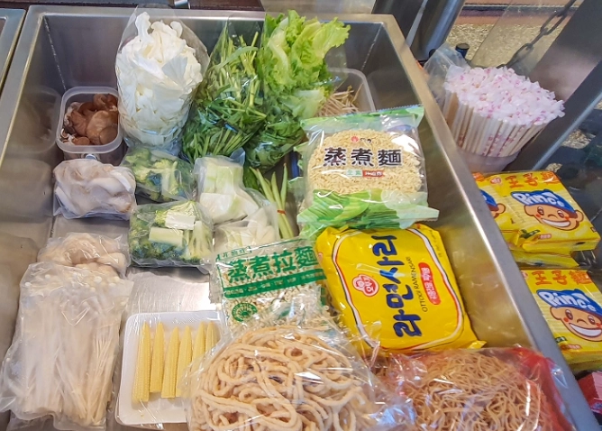 忠孝新生夜市美食攤位推薦與避坑指南